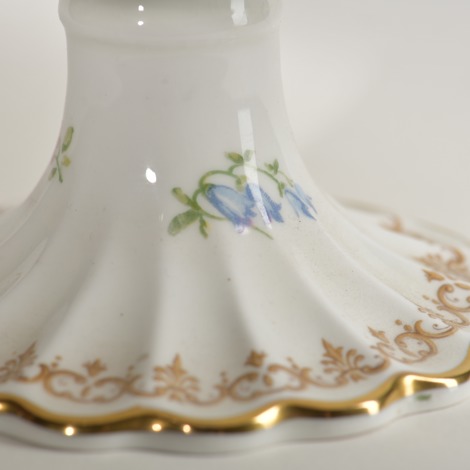 Floral detail on base